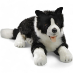 Border Collie lying, soft toy, stuffed animal